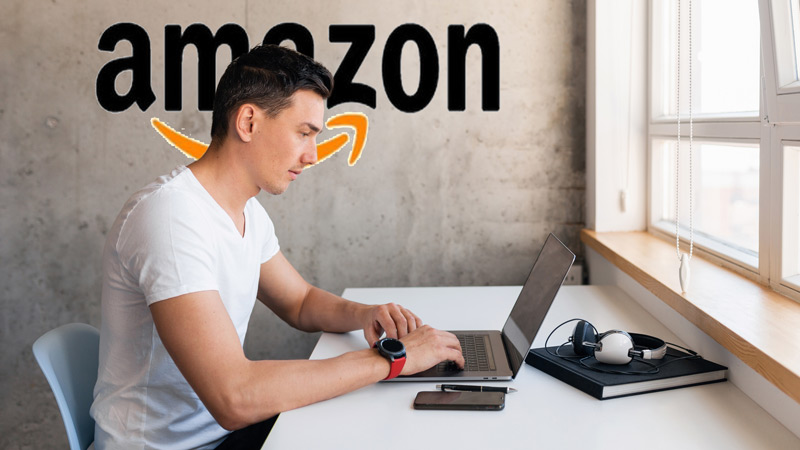 a man is working with computer in office